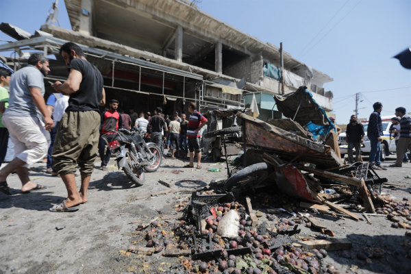 At least 14 killed in shelling on north Syria market rescuers say 2208200518