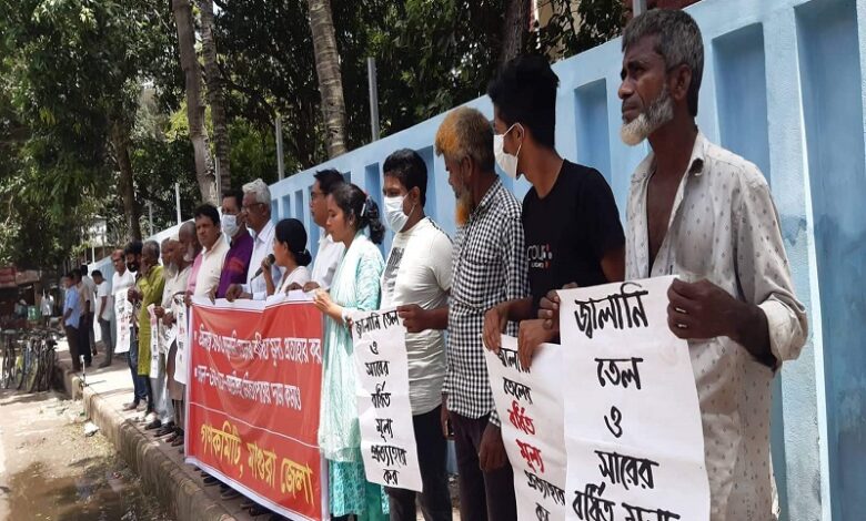 বি