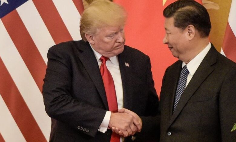 115011192 trumpandxihandshake